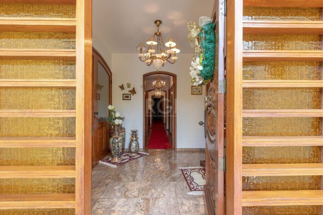 Imagem Casa com 4 Quartos à Venda,  em Vila Assunção - Porto Alegre