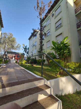 Imagem Imóvel com 2 Quartos à Venda, 66 m² em Vila Nova - Porto Alegre Imagem Imóvel com 2 Quartos à Venda, 66 m² em Vila Nova - Porto Alegre