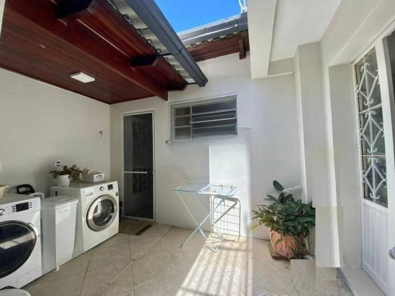 Imagem Casa com 4 Quartos à Venda, 233 m² em Menino Deus - Porto Alegre