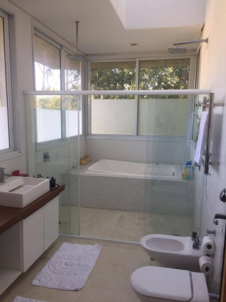 Imagem Casa com 4 Quartos à Venda ou Locação, 900 m² em Residencial Tamboré - Barueri
