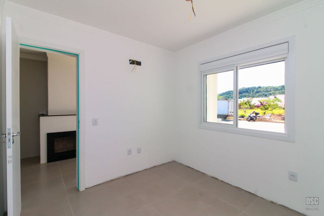 Imagem Casa com 3 Quartos à Venda, 90 m² em Hípica - Porto Alegre