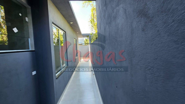 Imagem Casa com 2 Quartos à Venda, 130 m² em Golfinhos - Caraguatatuba