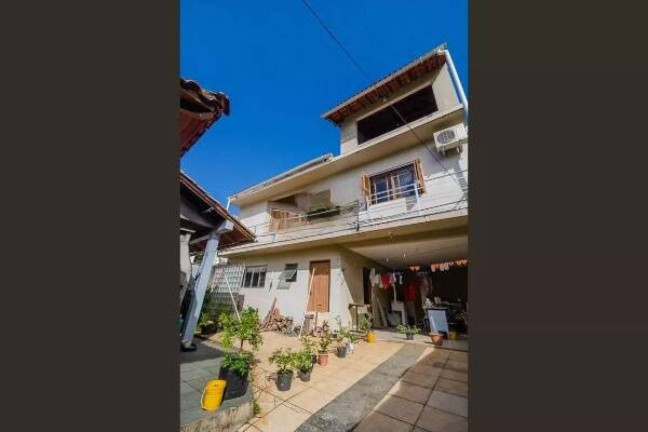 Imagem Casa com 3 Quartos à Venda, 396 m² em Partenon - Porto Alegre