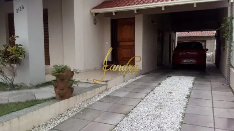 Imagem Casa com 3 Quartos à Venda, 290 m² em Girassol - Capão Da Canoa