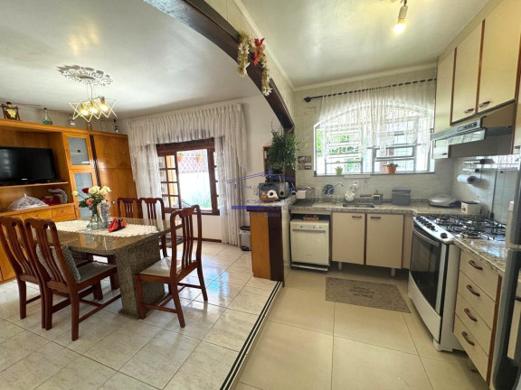 Imagem Casa com 3 Quartos à Venda, 244 m² em Cavalhada - Porto Alegre