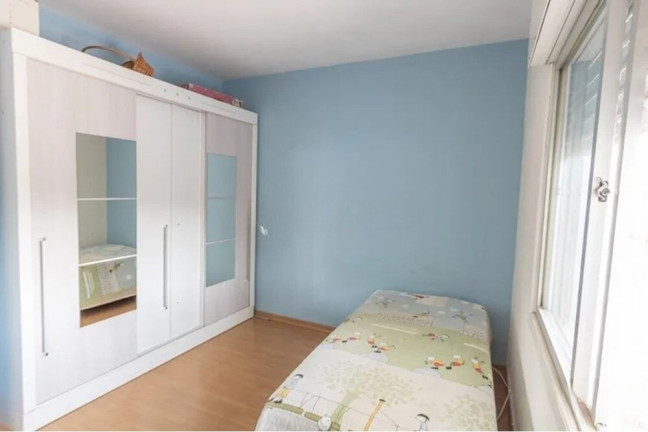 Imagem Casa com 4 Quartos à Venda, 239 m² em Nonoai - Porto Alegre