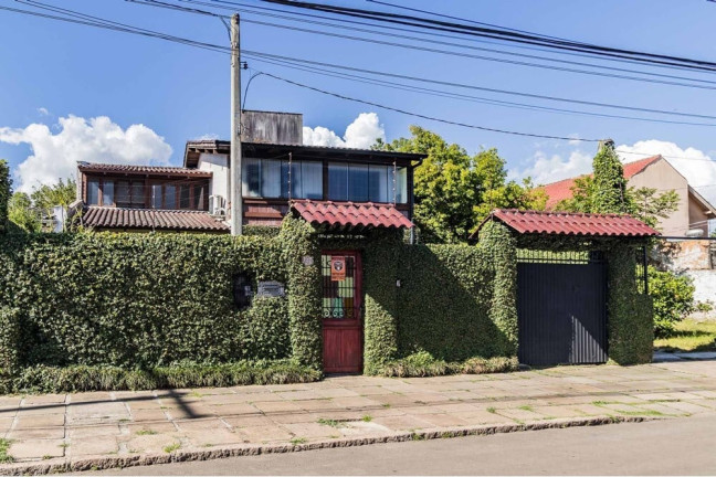Imagem Casa com 3 Quartos à Venda, 235 m² em Guarujá - Porto Alegre Imagem Casa com 3 Quartos à Venda, 235 m² em Guarujá - Porto Alegre
