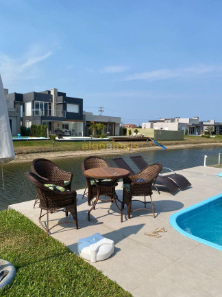 Imagem Casa com 4 Quartos à Venda, 180 m² em Condominio Riviera Xangri-la - Xangri-lá Imagem Casa com 4 Quartos à Venda, 180 m² em Condominio Riviera Xangri-la - Xangri-lá