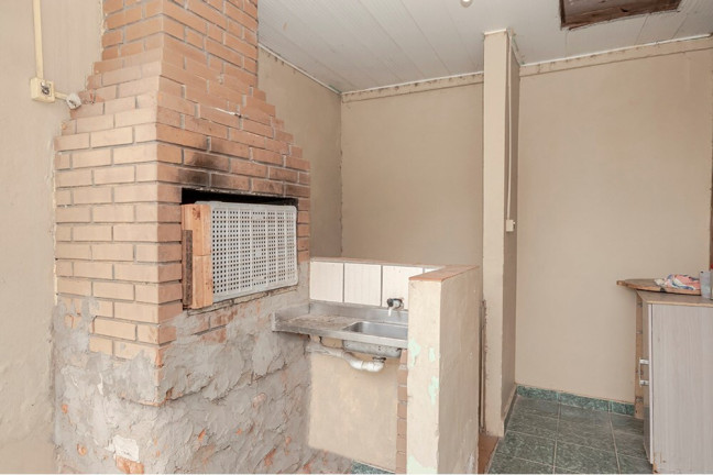 Imagem Casa com 4 Quartos à Venda, 170 m² em Vila Nova - Porto Alegre