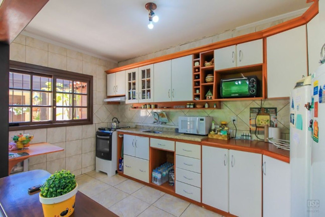 Imagem Casa com 3 Quartos à Venda, 198 m² em Cavalhada - Porto Alegre