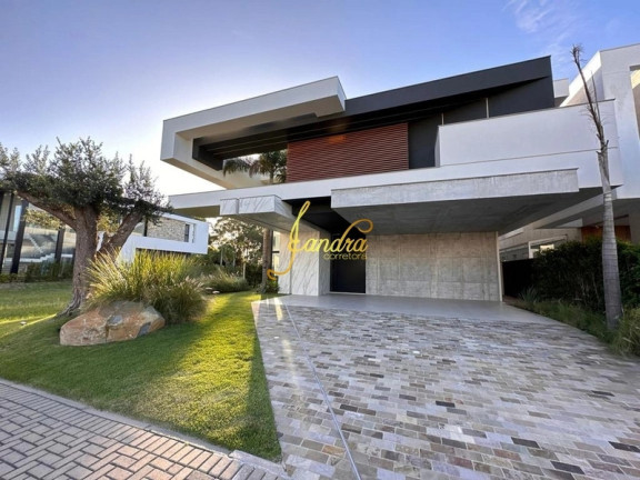 Imagem Casa de Condomínio com 6 Quartos à Venda, 588 m² em Zona Nova - Capão Da Canoa