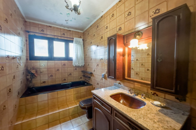 Imagem Casa com 3 Quartos à Venda, 285 m² em Bela Vista - Porto Alegre