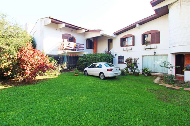Imagem Casa com 4 Quartos à Venda, 458 m² em Partenon - Porto Alegre Imagem Casa com 4 Quartos à Venda, 458 m² em Partenon - Porto Alegre