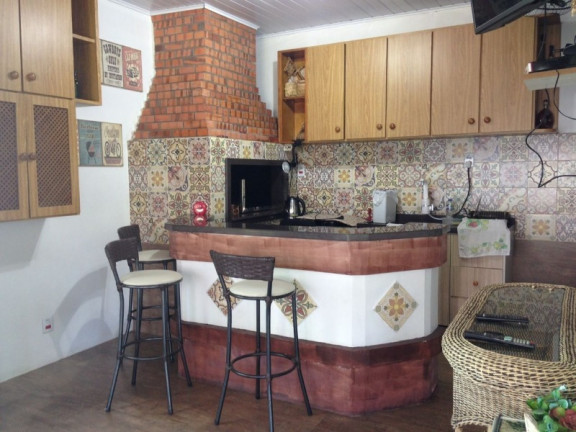 Imagem Casa com 3 Quartos à Venda, 339 m² em Ipanema - Porto Alegre