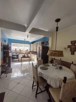 Imagem Casa com 4 Quartos à Venda, 329 m² em Vila Nova - Porto Alegre