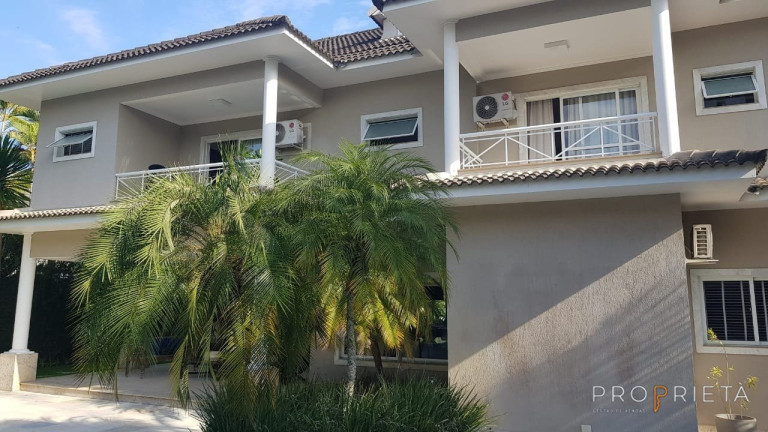 Imagem Casa de Condomínio com 6 Quartos à Venda, 854 m² em Barra Da Tijuca - Rio De Janeiro Imagem Casa de Condomínio com 6 Quartos à Venda, 854 m² em Barra Da Tijuca - Rio De Janeiro