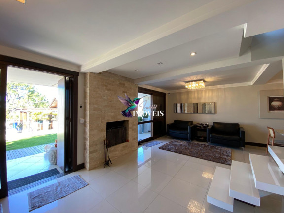Imagem Casa com 4 Quartos à Venda, 204 m² em Centenário - Torres