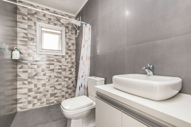 Imagem Casa de Condomínio com 3 Quartos à Venda, 180 m² em Mário Quintana - Porto Alegre
