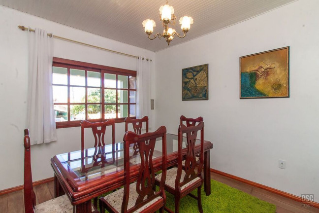 Imagem Casa com 3 Quartos à Venda, 216 m² em Vila Nova - Porto Alegre