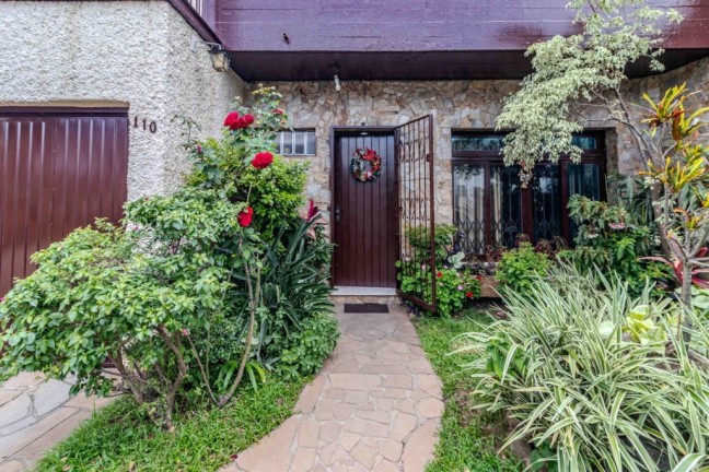 Imagem Casa com 4 Quartos à Venda, 250 m² em São João - Porto Alegre
