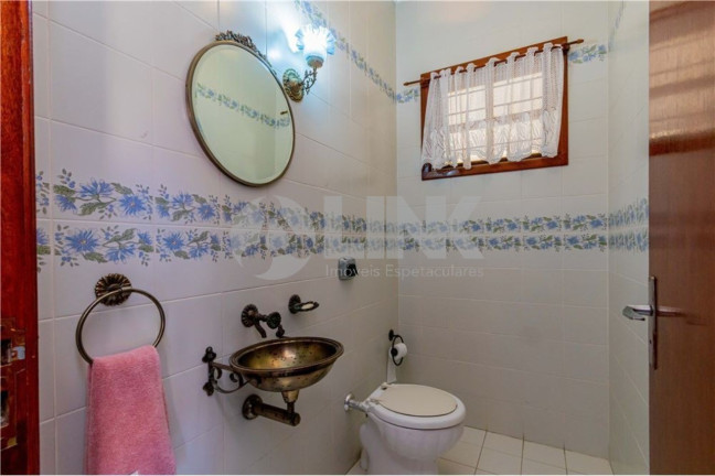 Imagem Casa com 4 Quartos à Venda,  em Jardim Itu - Porto Alegre