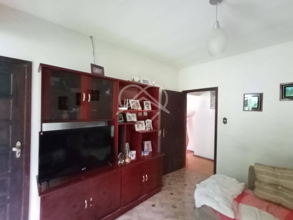 Imagem Casa com 5 Quartos à Venda, 220 m²