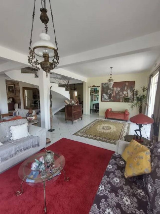 Imagem Casa com 4 Quartos à Venda, 329 m² em Vila Nova - Porto Alegre