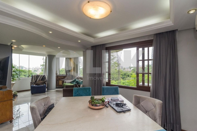 Imagem Imóvel com 3 Quartos à Venda, 215 m² em Vila Ipiranga - Porto Alegre