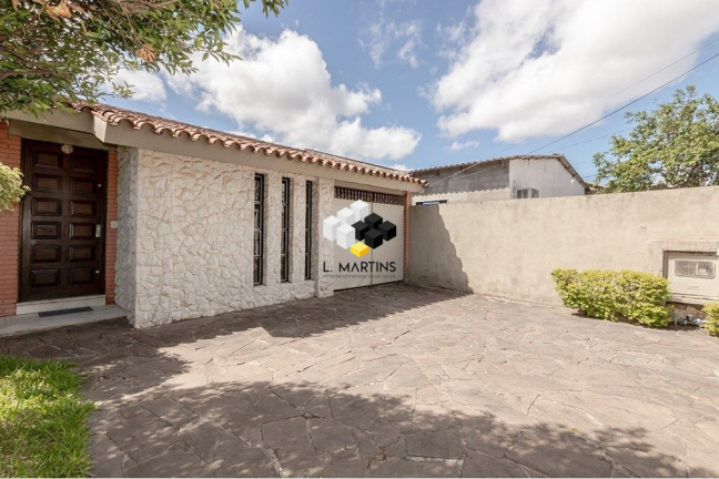 Imagem Casa com 4 Quartos à Venda, 381 m² em Camaquã - Porto Alegre Imagem Casa com 4 Quartos à Venda, 381 m² em Camaquã - Porto Alegre