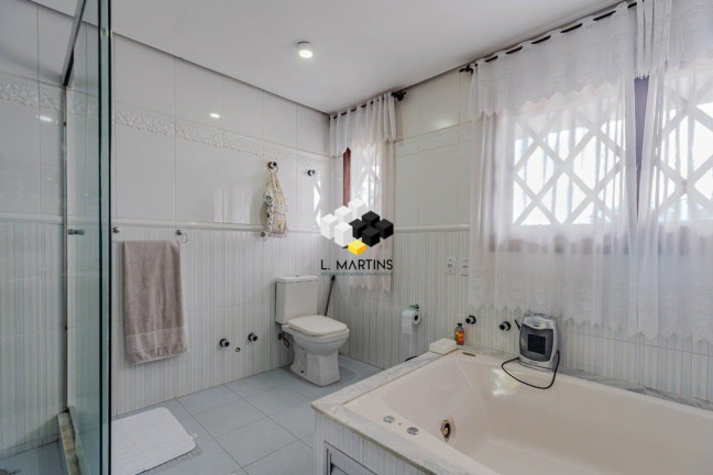 Imagem Casa de Condomínio com 3 Quartos à Venda, 385 m² em Agronomia - Porto Alegre