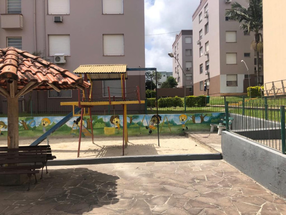 Imagem Apartamento com 2 Quartos à Venda, 63 m² em Protasio - Porto Alegre