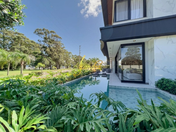 Imagem Casa de Condomínio com 6 Quartos à Venda, 588 m² em Zona Nova - Capão Da Canoa