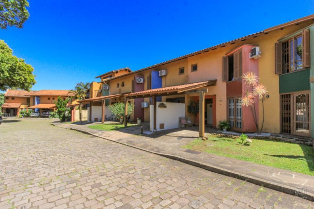 Imagem Casa com 4 Quartos à Venda, 117 m² em Cavalhada - Porto Alegre