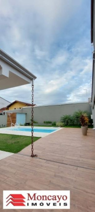Imagem Sobrado com 4 Quartos à Venda, 360 m² em Jardim Britânia - Caraguatatuba