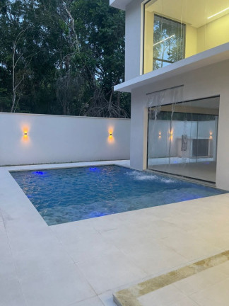 Imagem Casa com 4 Quartos à Venda, 560 m² em Ponta Negra - Manaus