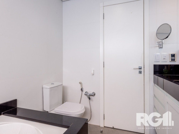 Imagem Casa com 3 Quartos à Venda, 400 m² em Três Figueiras - Porto Alegre