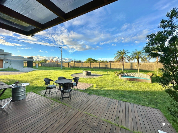 Imagem Casa de Condomínio com 4 Quartos à Venda, 180 m² em Dubai - Capão Da Canoa