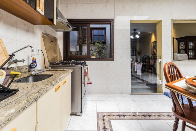 Imagem Casa com 4 Quartos à Venda, 216 m² em Partenon - Porto Alegre