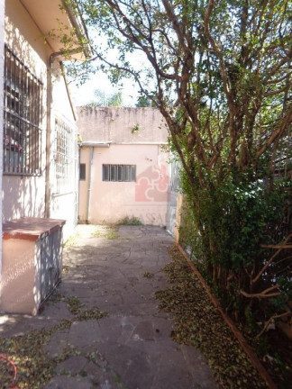 Imagem Casa com 3 Quartos à Venda, 150 m² em Menino Deus - Porto Alegre