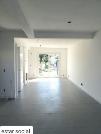 Imagem Casa de Condomínio com 3 Quartos à Venda, 150 m² em Mário Quintana - Porto Alegre
