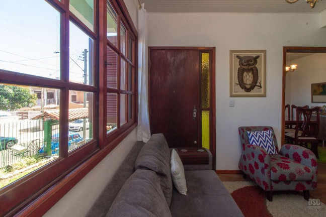 Imagem Casa com 3 Quartos à Venda, 216 m² em Vila Nova - Porto Alegre