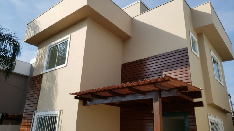 Imagem Casa com 3 Quartos à Venda, 100 m² em Campeche - Florianópolis Imagem Casa com 3 Quartos à Venda, 100 m² em Campeche - Florianópolis