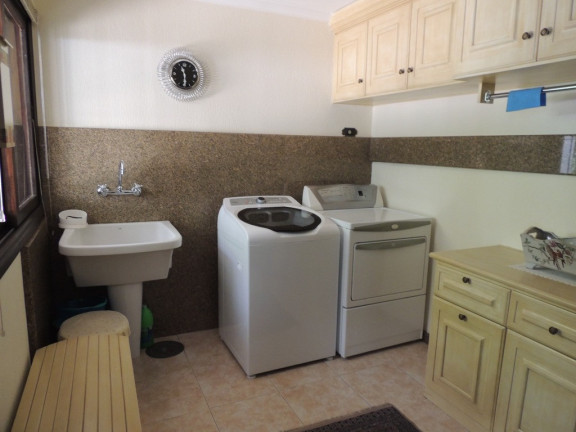 Imagem Casa com 4 Quartos à Venda, 430 m² em Vila Assunção - Porto Alegre