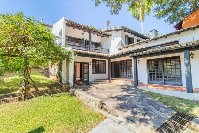 Imagem Casa com 4 Quartos à Venda, 348 m² em Ipanema - Porto Alegre