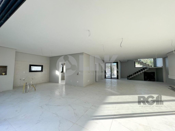 Imagem Imóvel com 4 Quartos à Venda, 371 m² em Vila Nova - Porto Alegre