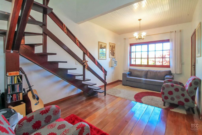 Imagem Casa com 3 Quartos à Venda, 216 m² em Vila Nova - Porto Alegre