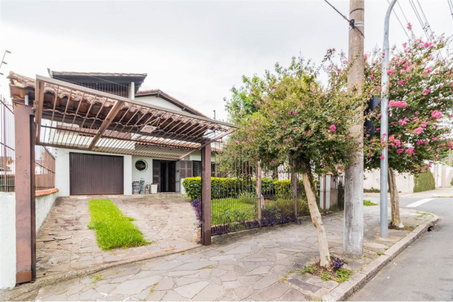 Imagem Casa com 4 Quartos à Venda, 313 m² em Cavalhada - Porto Alegre