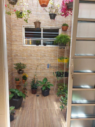 Imagem Casa com 3 Quartos à Venda, 220 m² em Calmon Viana - Poá