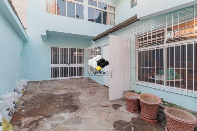 Imagem Casa com 6 Quartos à Venda, 190 m² em Santana - Porto Alegre
