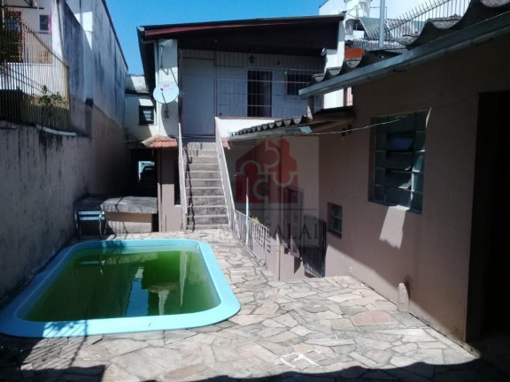 Imagem Casa com 3 Quartos à Venda, 251 m² em Azenha - Porto Alegre Imagem Casa com 3 Quartos à Venda, 251 m² em Azenha - Porto Alegre